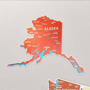 Terracotta renkli Alaska parçası yakın çekim, Yukon Nehri ve Anchorage isimleri okunuyor
